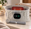 Auremib HeatRelief Belt in grey with digital display showing 65C